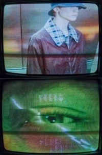 two tv screens with a man in a hat and a woman in a hat